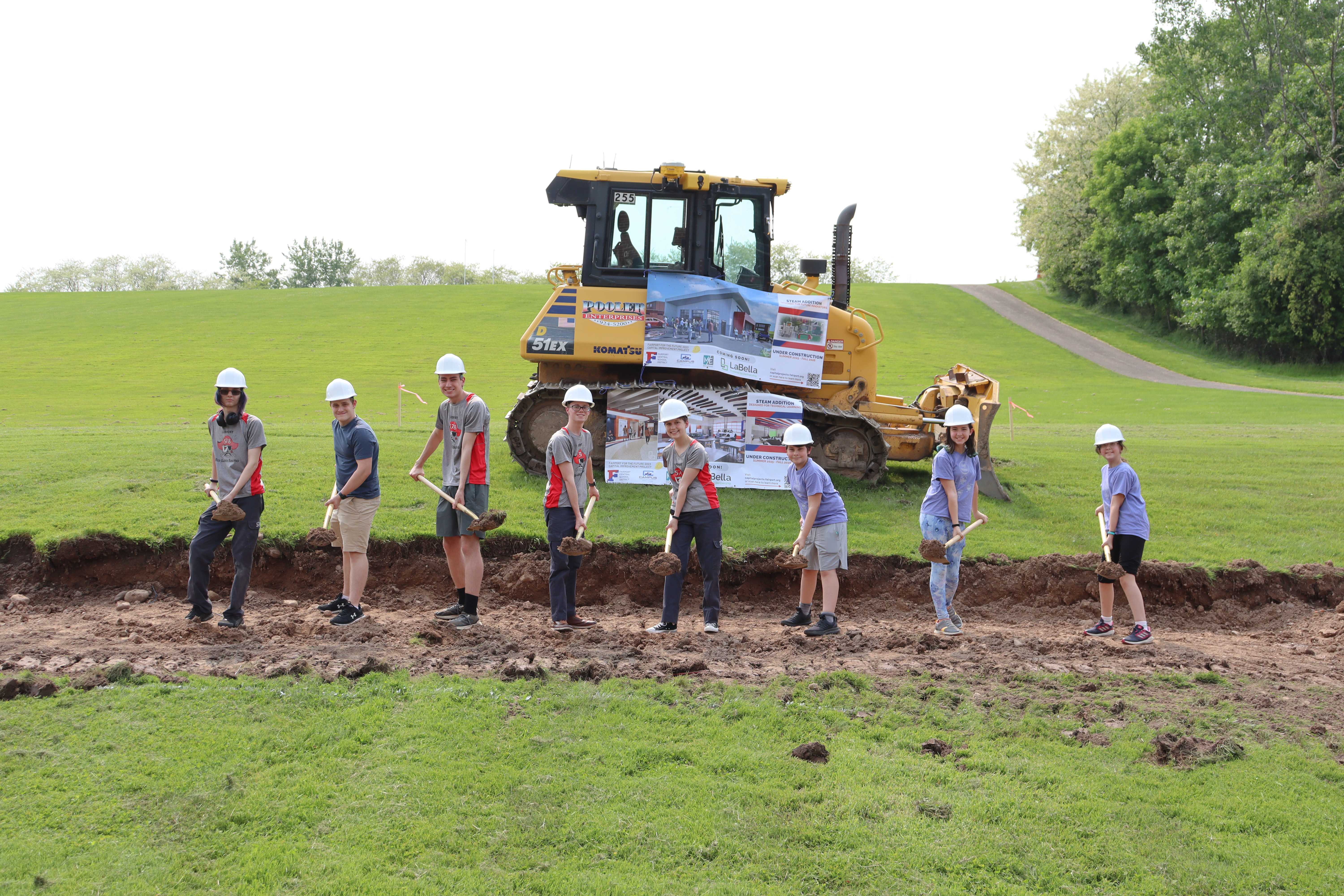 Students break ground on STEAM addition at Fairport High School